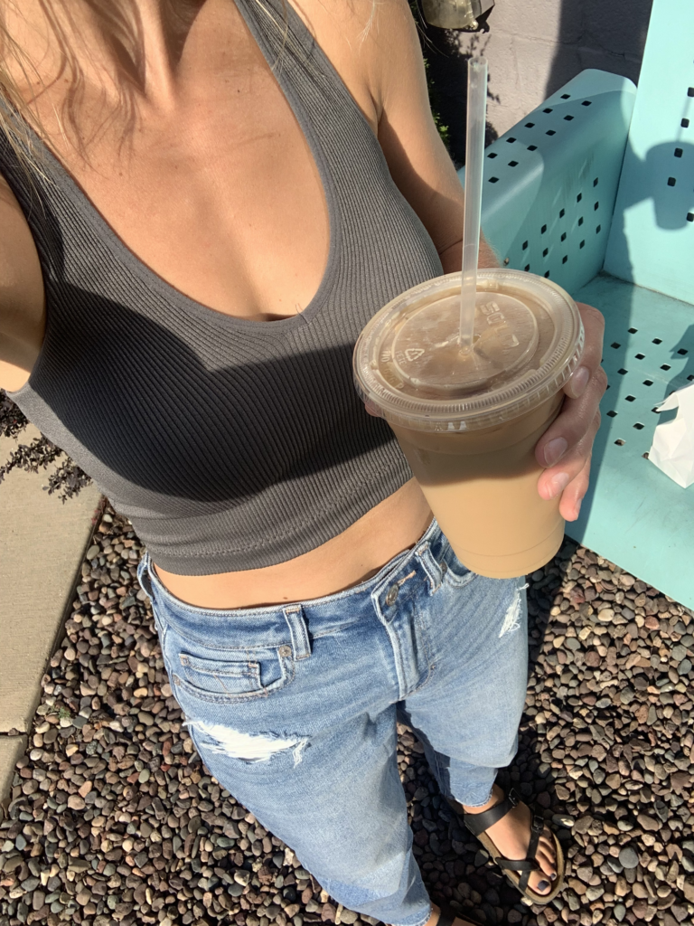 Pinterest girl cropped grey tank, jeans and iced coffee